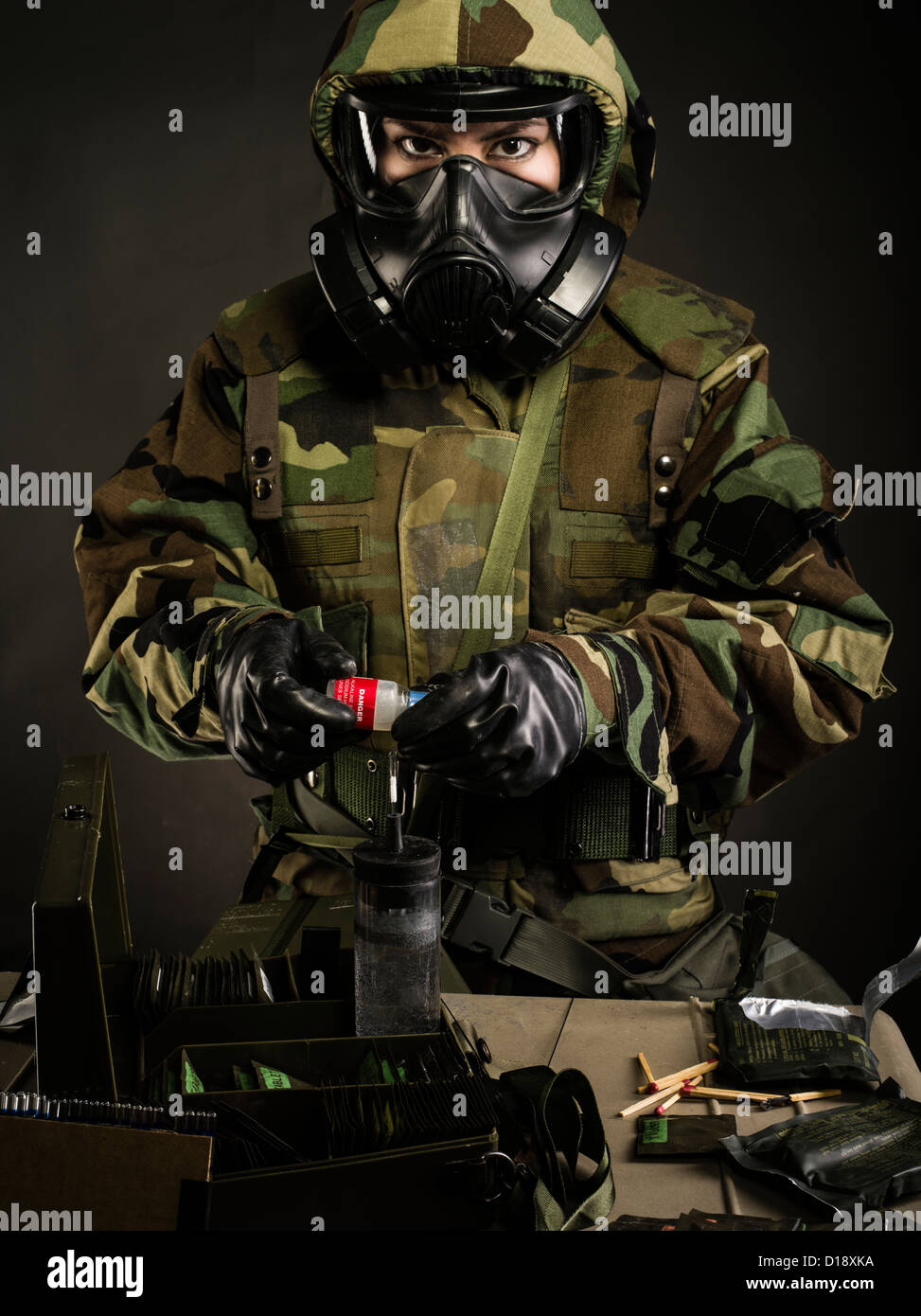 US Marine in MOPP gear inc gas mask uses M272 Chemical Agent Water Testing  Kit ( lewisite, nerve agents, cyanide and mustard Stock Photo - Alamy