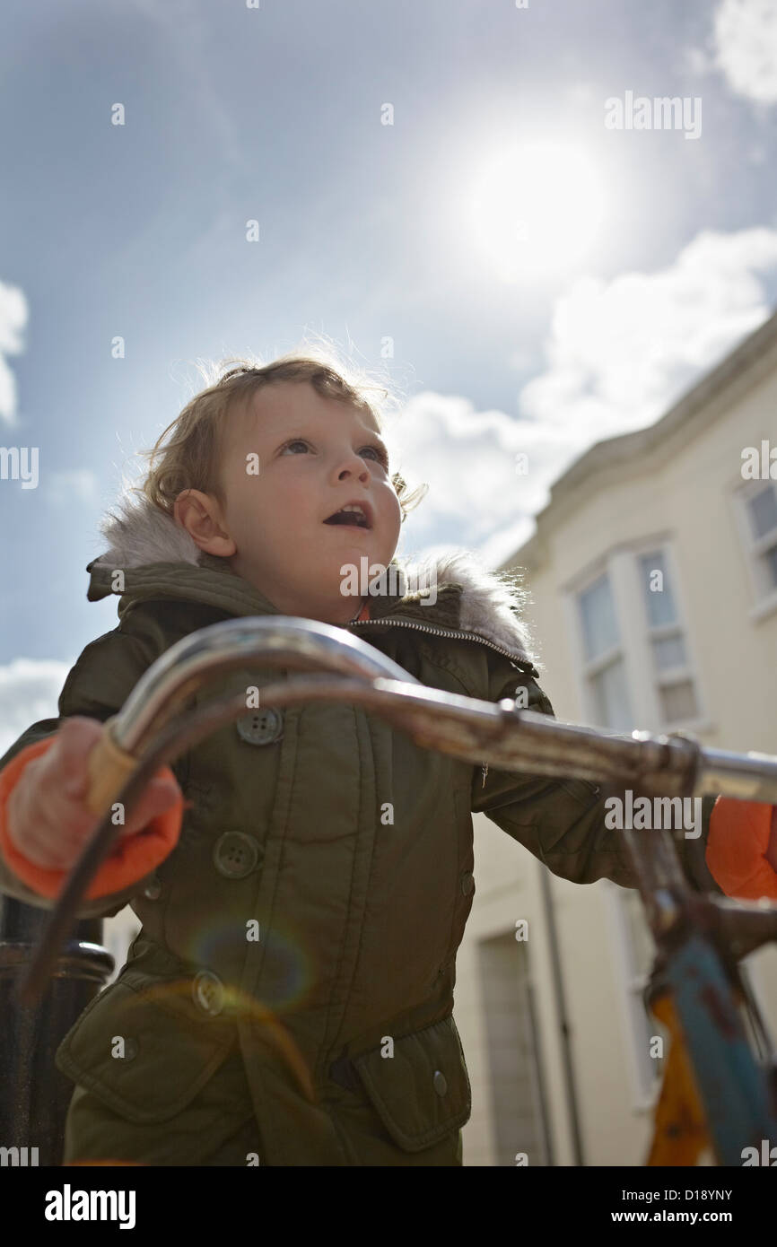 Mod toddler boy on retro bicycle Stock Photo
