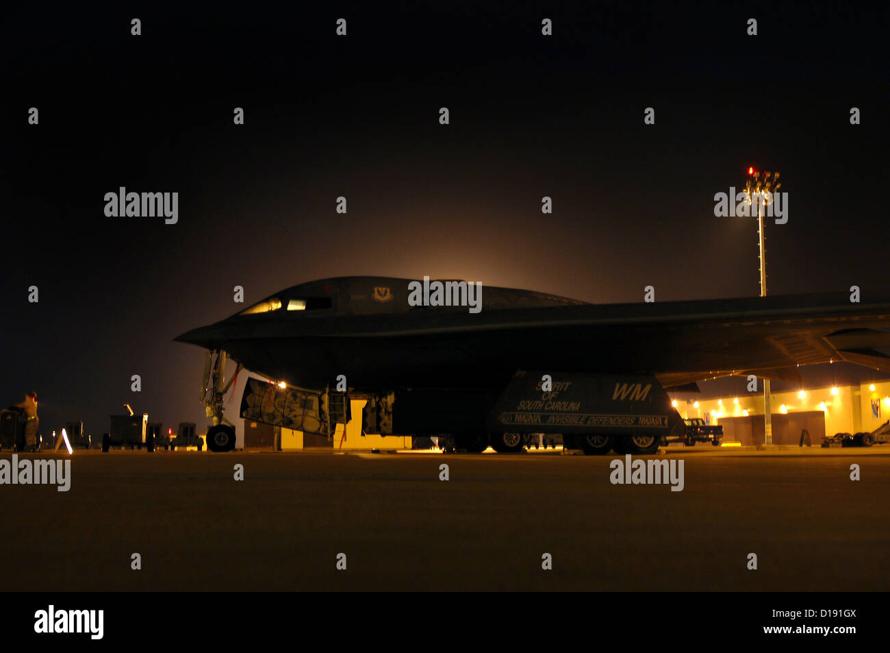 A B-2 Spirit stealth bomber on the flight line following night operations at Whiteman Air Force Base August 26, 2009 in Knob Noster, MO. Stock Photo