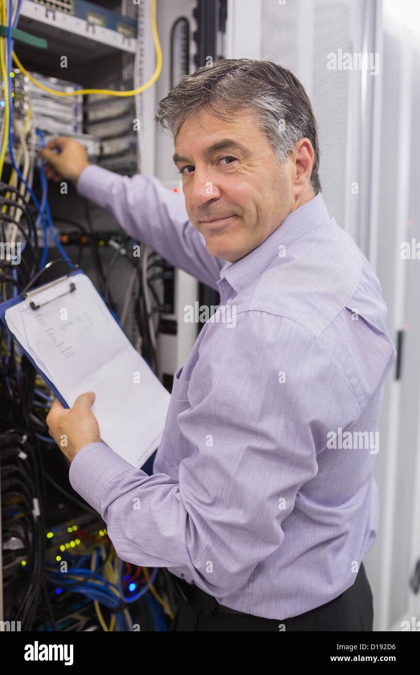 Data center worker checking the servers Stock Photo - Alamy