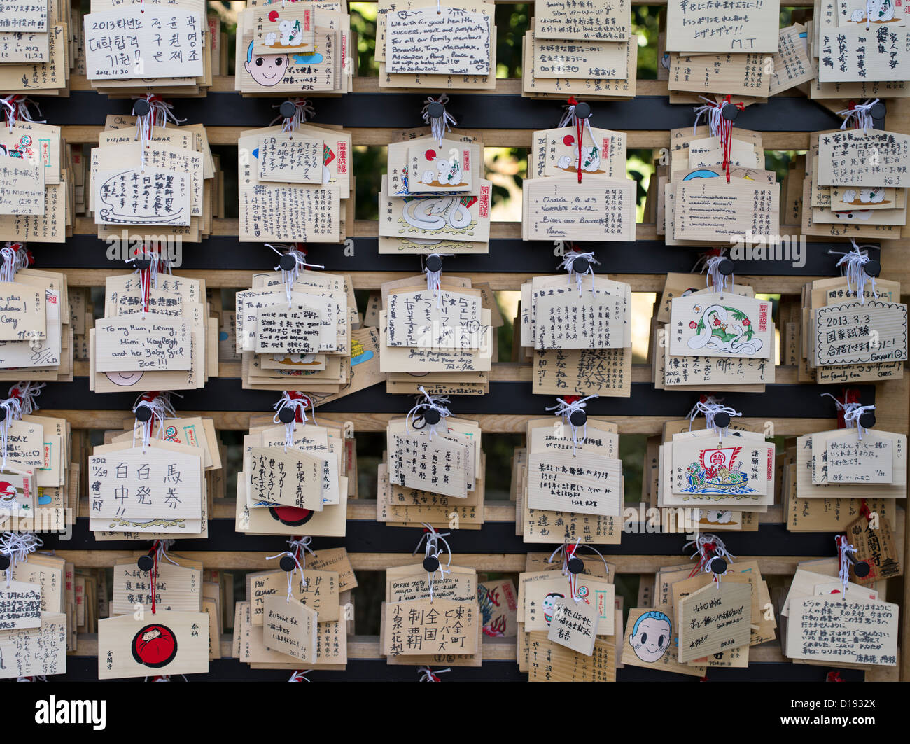Ema Prayer tablets with handwritten prayers at Kinkaku-ji Temple home to the Golden Pavilion in Kyoto Japan Stock Photo
