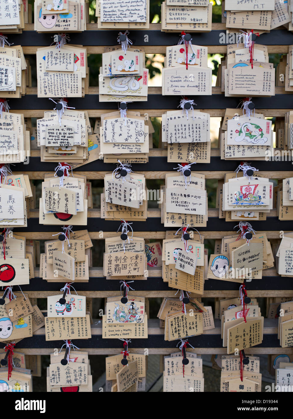 Ema Prayer tablets with handwritten prayers at Kinkaku-ji Temple home to the Golden Pavilion in Kyoto Japan Stock Photo