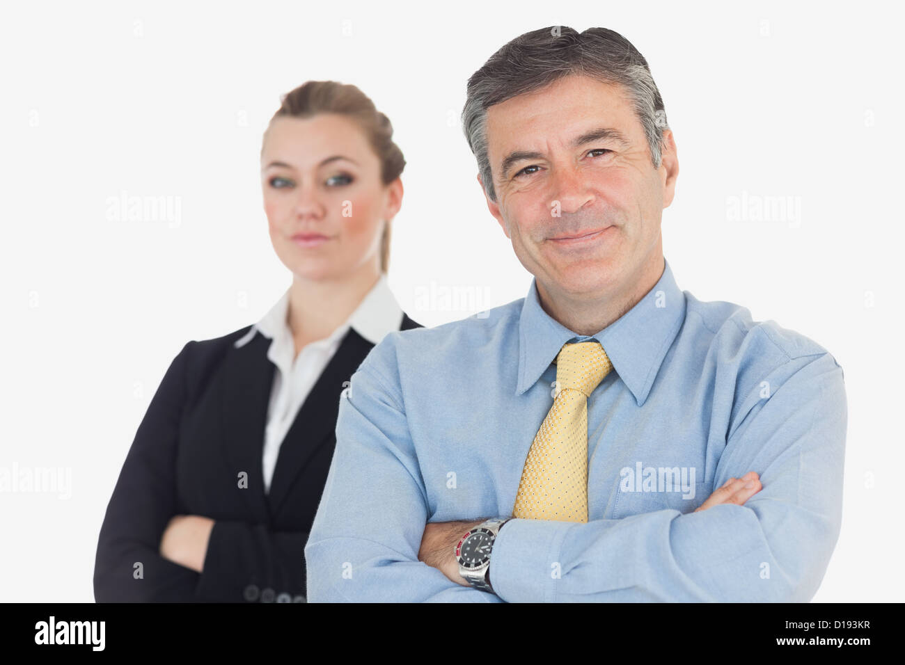 Confident business people with arms crossed Stock Photo - Alamy