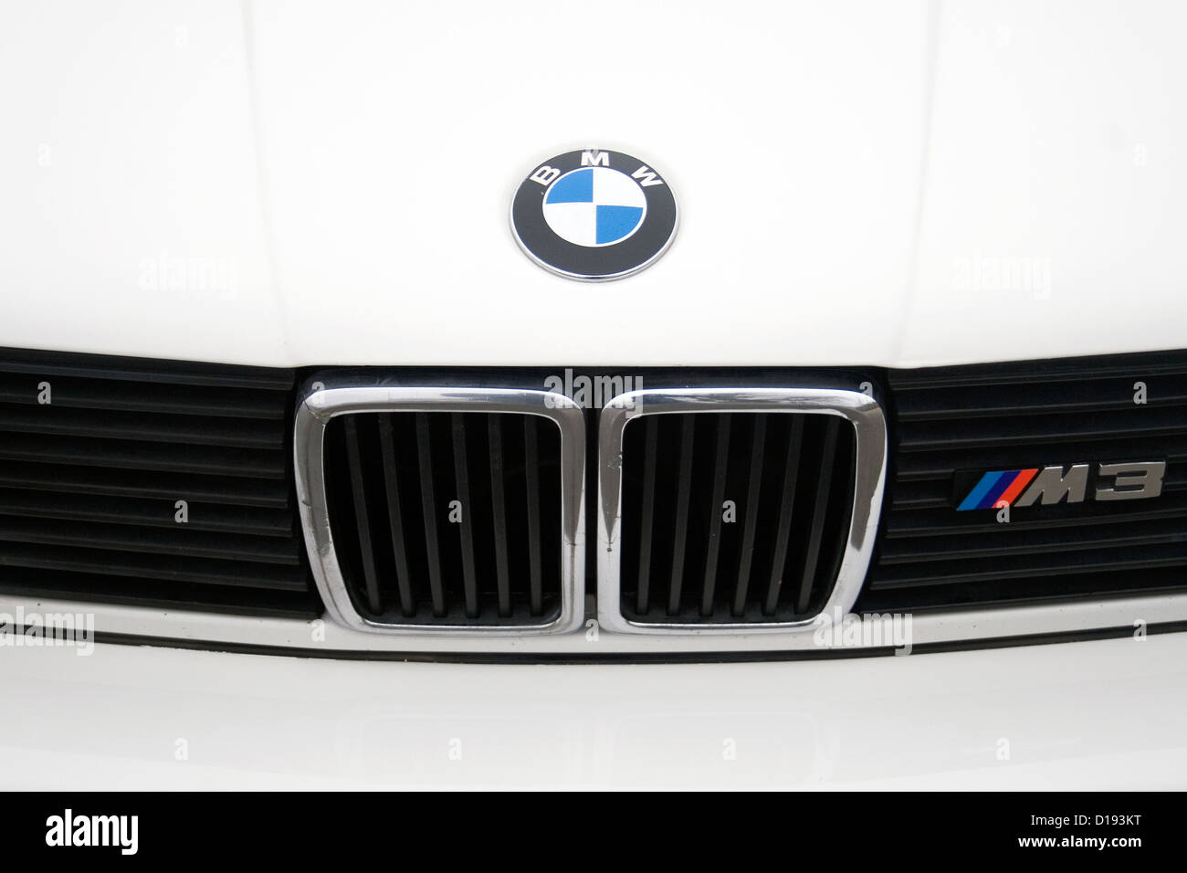 The front grill and badge of a classic white BMW M3 car Stock Photo - Alamy