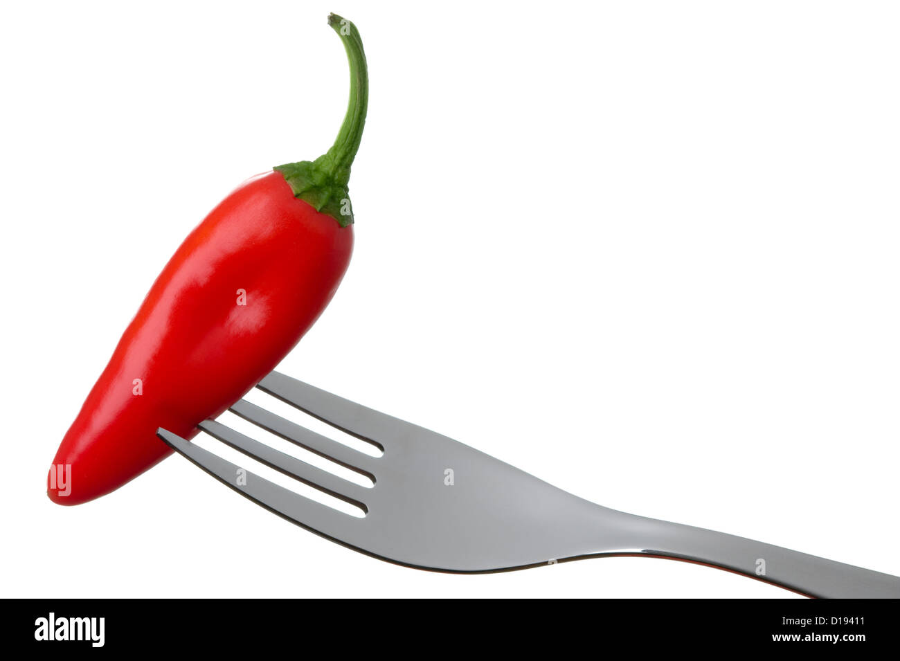 red hot chili pepper on a fork against white background Stock Photo