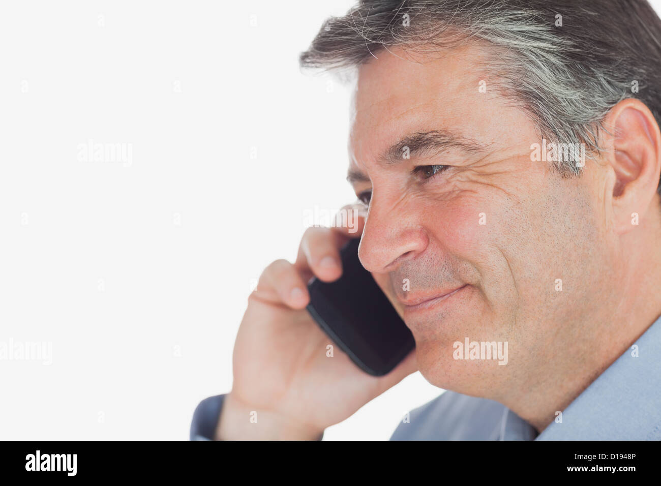 Mature man smiles holding hi-res stock photography and images - Alamy