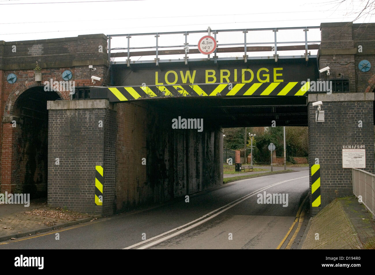 low bridge bridges sign signs road rail height restriction uk Stock Photo