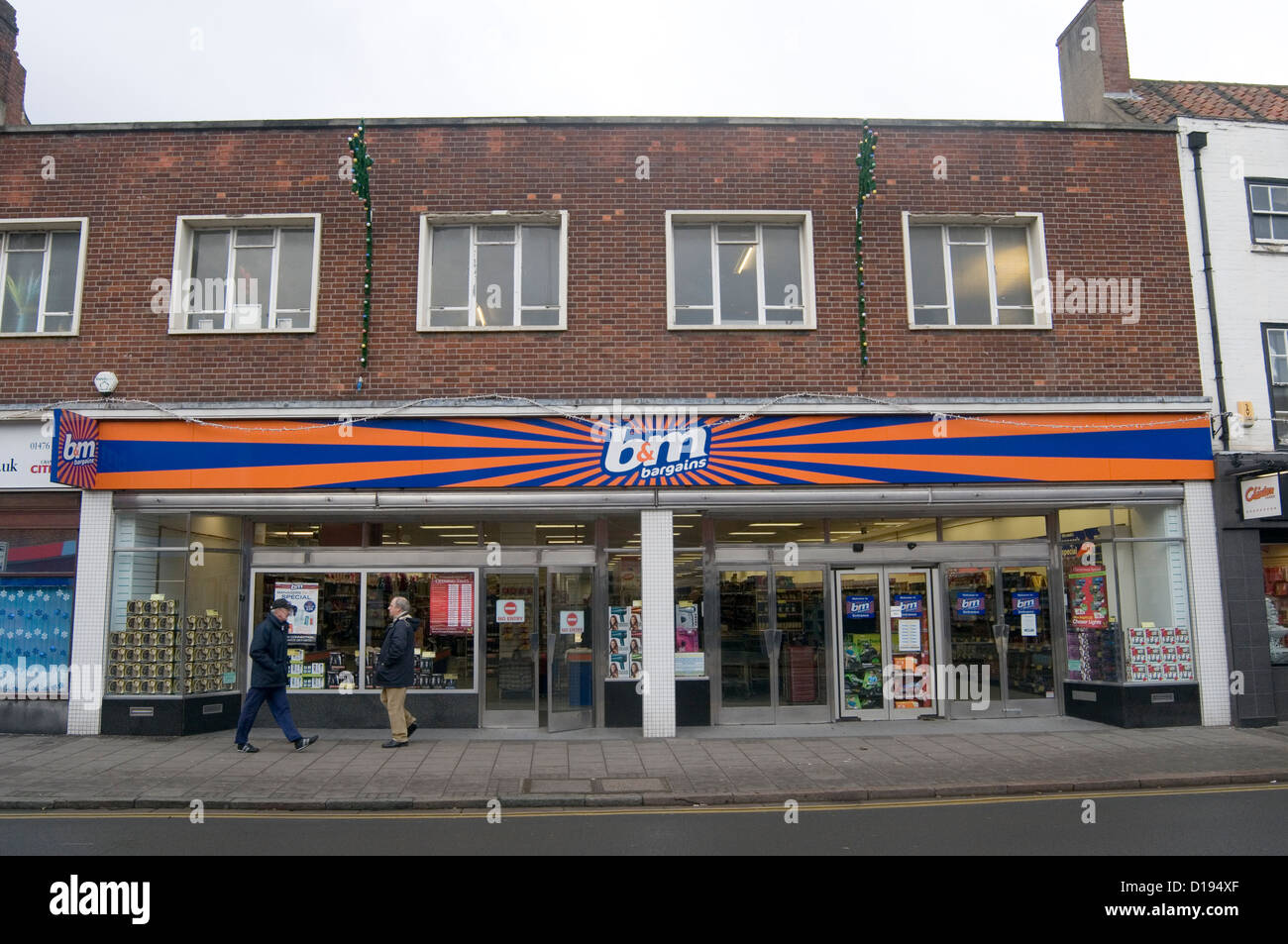 b&m b and m bargin store stores retail retailers uk highstreet high street shop shops poundshop pound in former woolworths premi Stock Photo