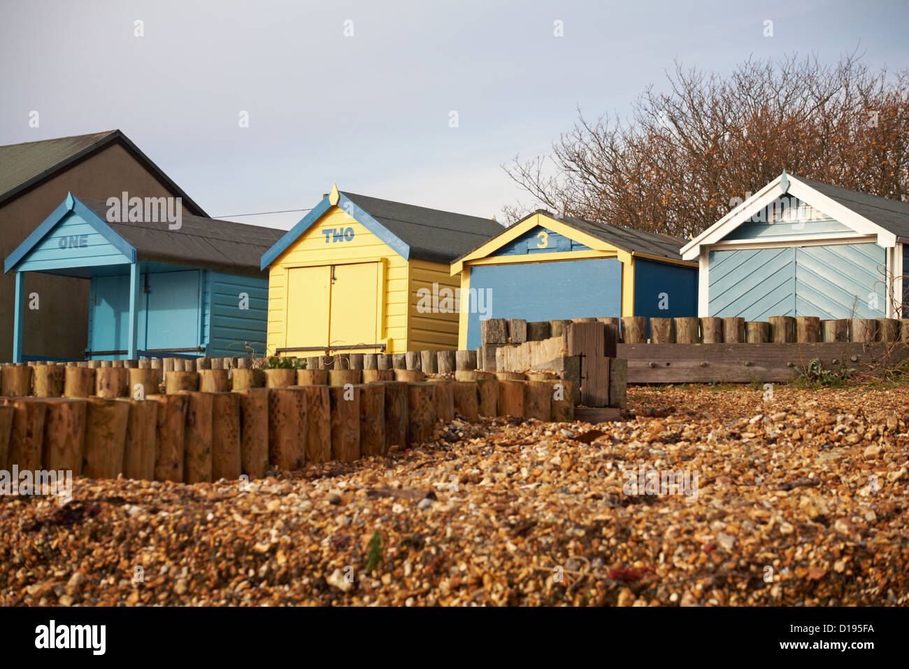 One, Two, 3, Four beach huts at Calshot, Hampshire in November Stock Photo