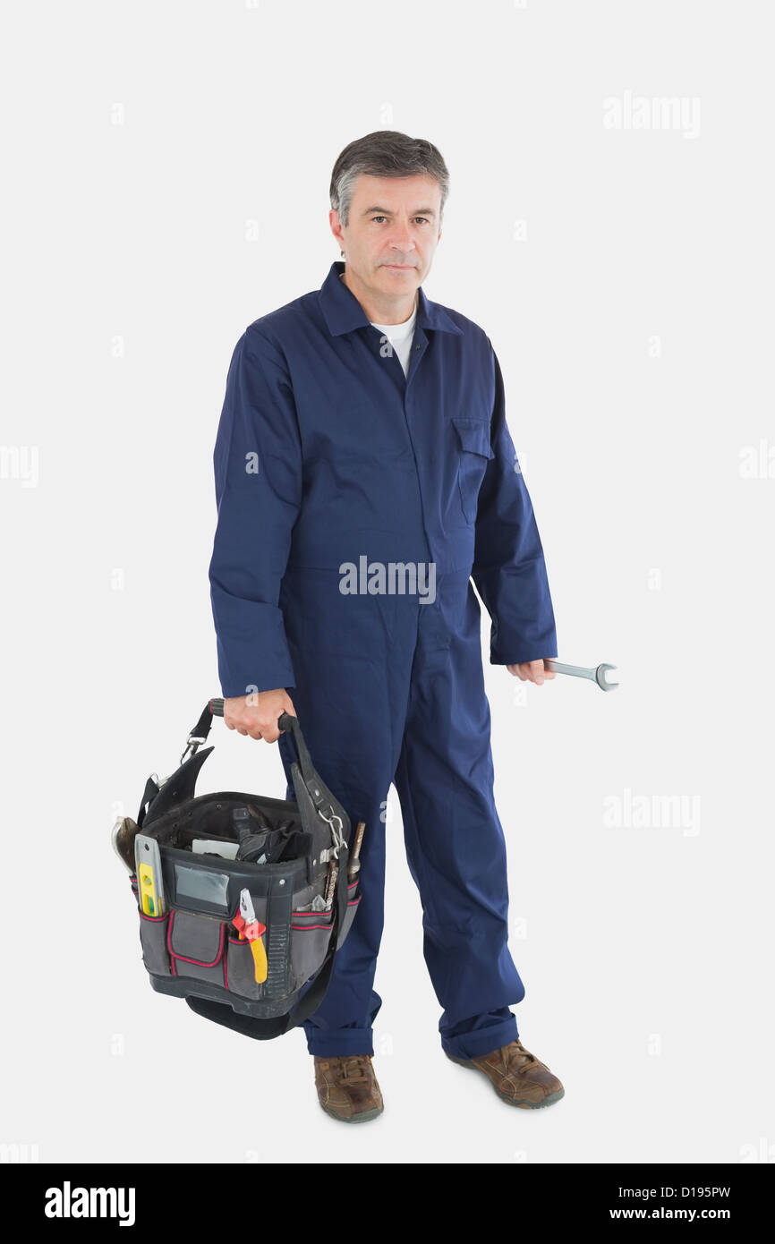 Portrait of mechanic carrying tool bag Stock Photo Alamy