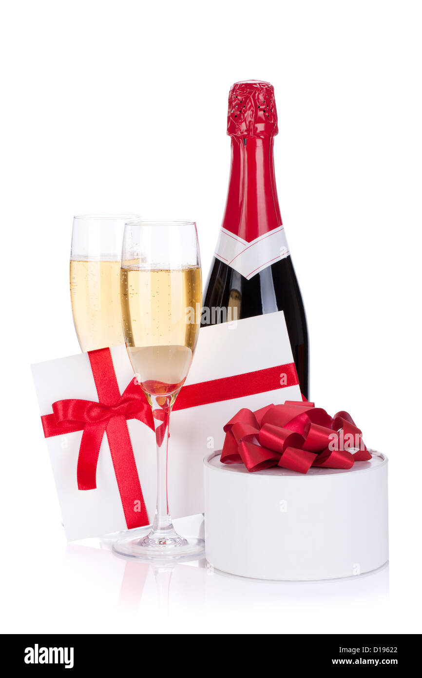 Champagne bottle, glasses and gift. Isolated on white background Stock ...