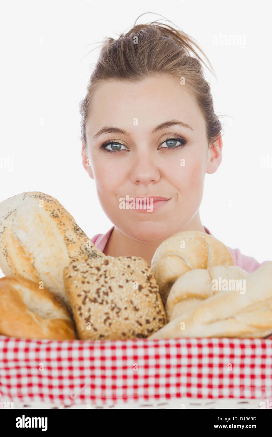 Young woman with variety of breads Stock Photo Alamy