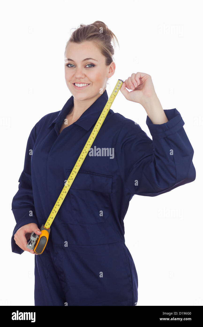 Female Mechanic With Measuring Tape Stock Photo Alamy female-mechanic-with-measuring-tape-stock-photo-alamy