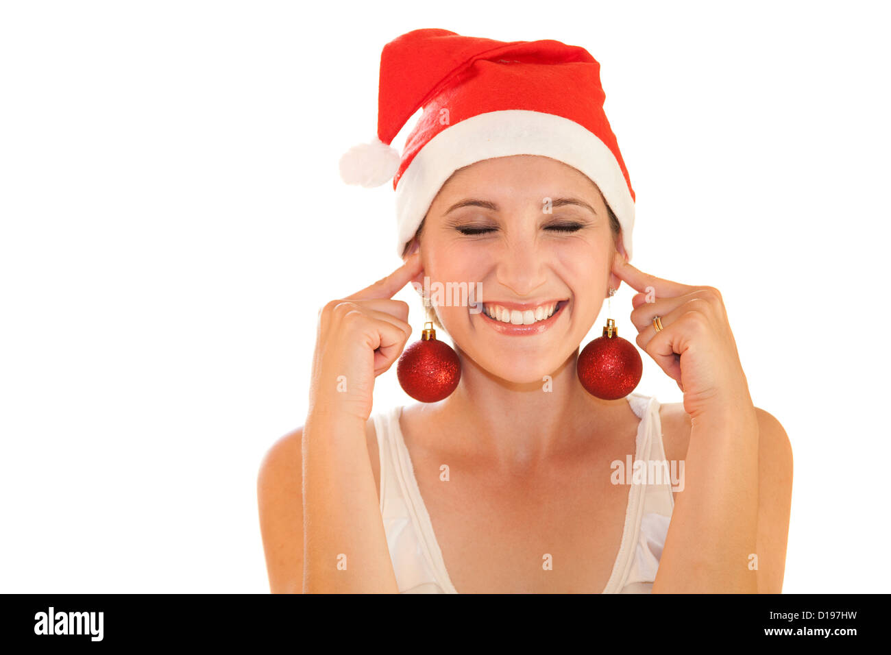 woman wearing Christmas hat blocking ears Stock Photo