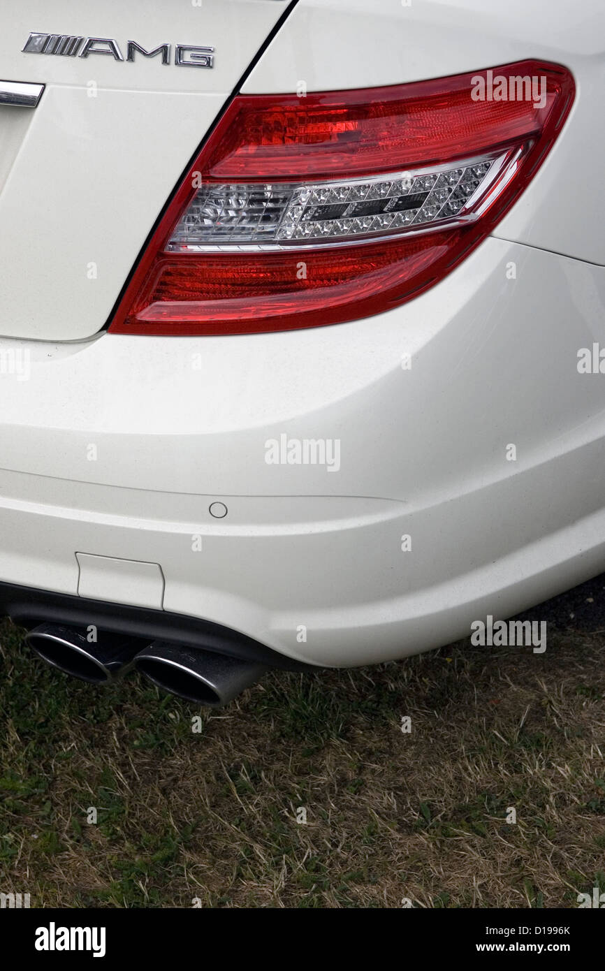 The back of a white AMG Mercedes supercar at a car show Stock Photo - Alamy