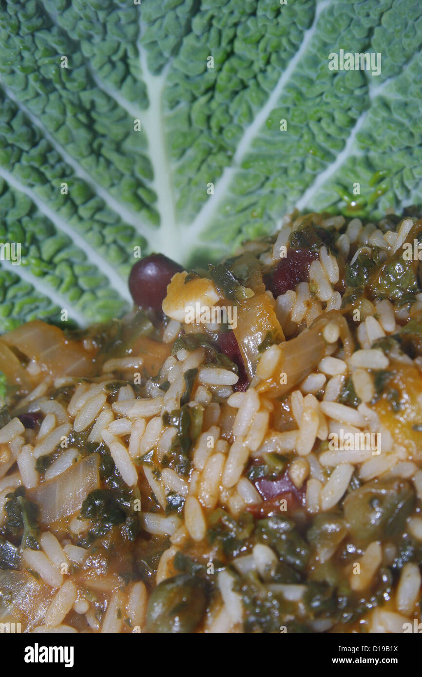 homemade puerto rican rice with a savoy cabbage leaf Stock Photo