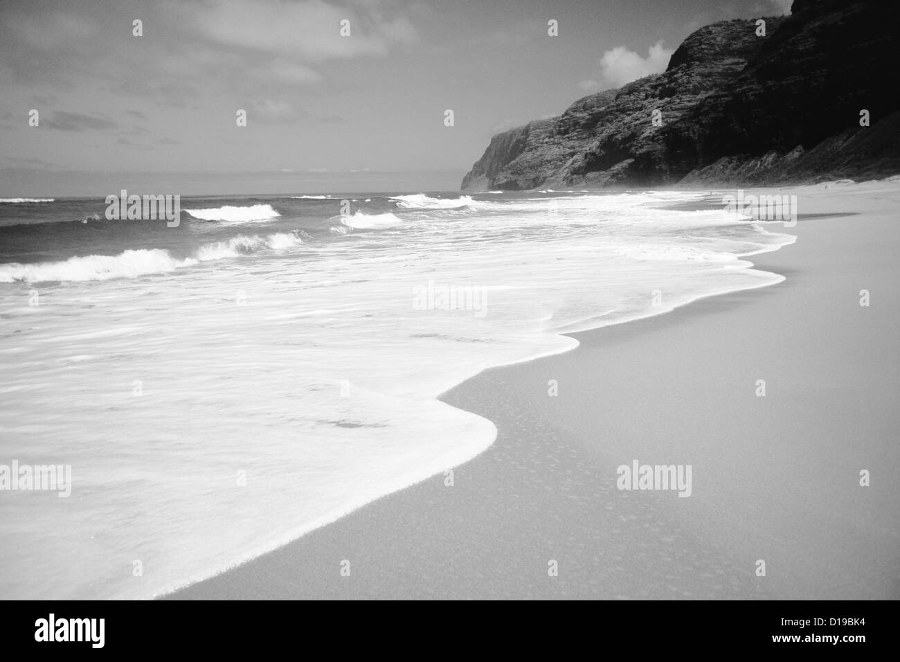 Hawaii, Kauai, Polihale Beach, Ocean Washing Up On Shoreline (Black And White Photograph). Stock Photo