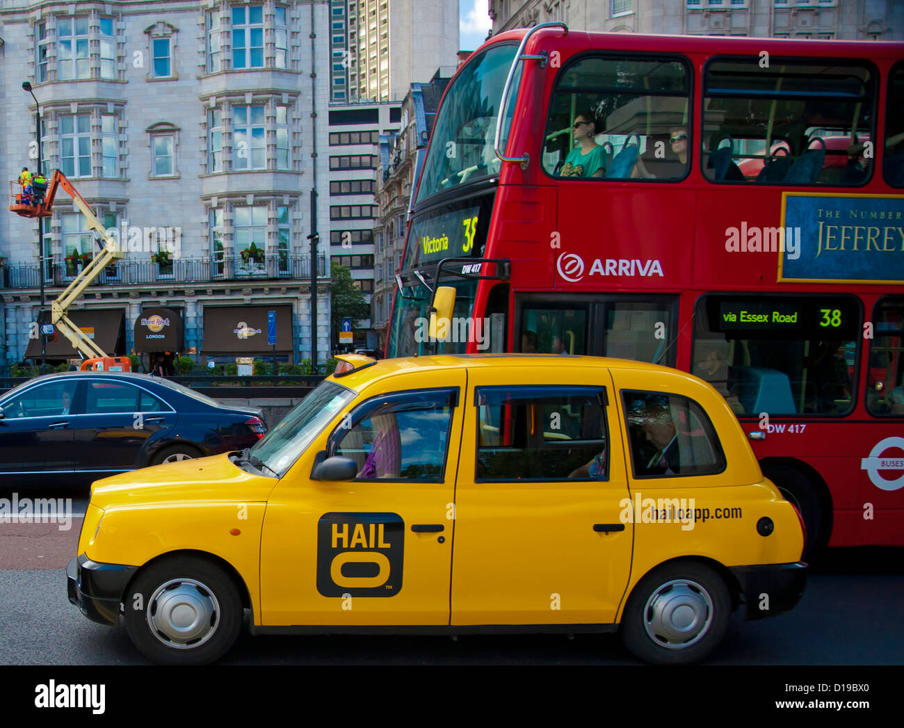 Yellow taxi and red bus on Piccadilly near Green Park, City of Westminster, London, Greater London, England, United Kingdom Stock Photo