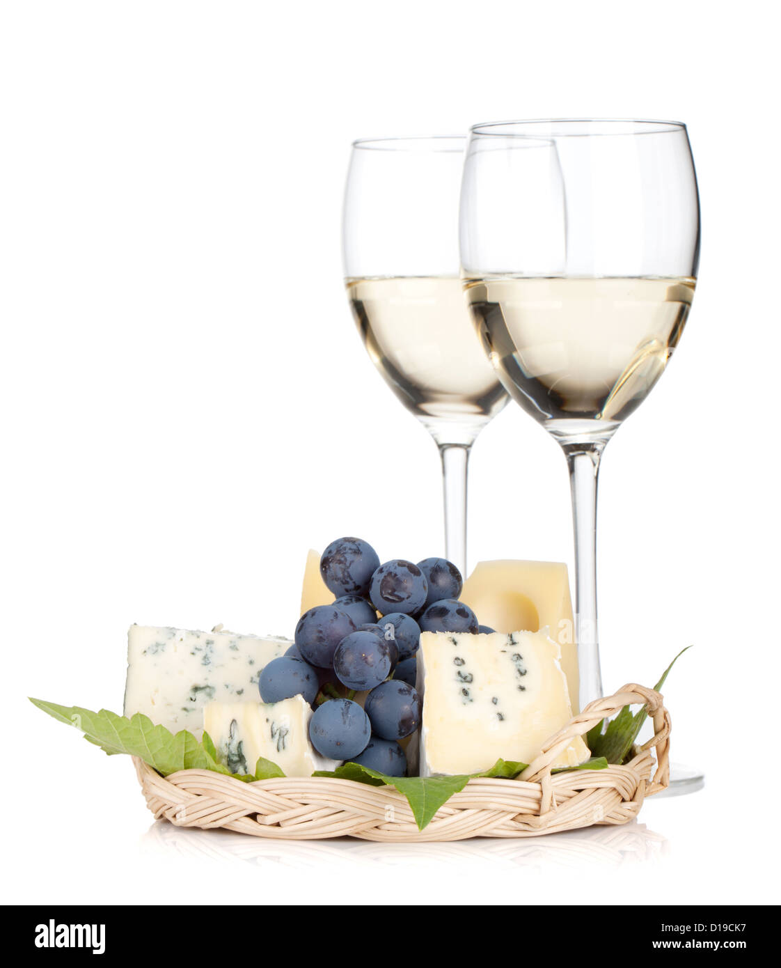 Cheese, grape and two white wine glasses. Isolated on white background Stock Photo