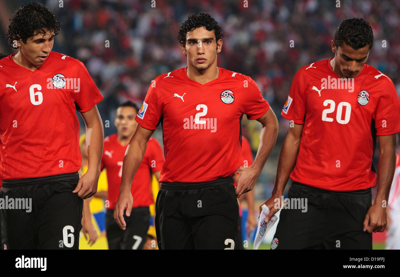 Egypt players Ahmed Hegazy (6), Salah Soliman (2) and Hussam Arafat  get set for team introductions before a U20 World Cup match Stock Photo