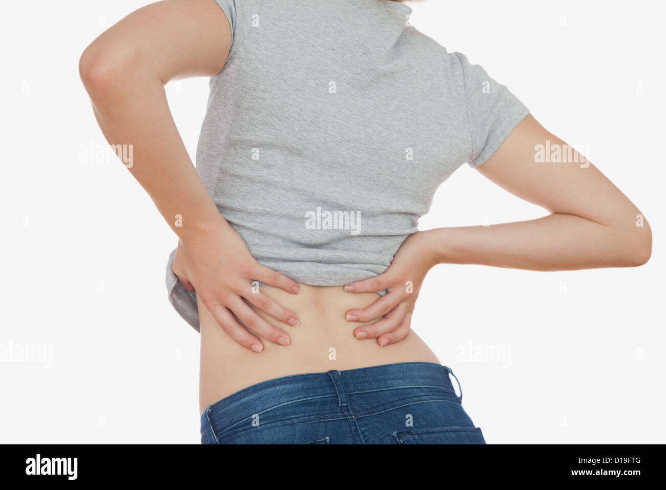 Rear view of woman with backache Stock Photo Alamy