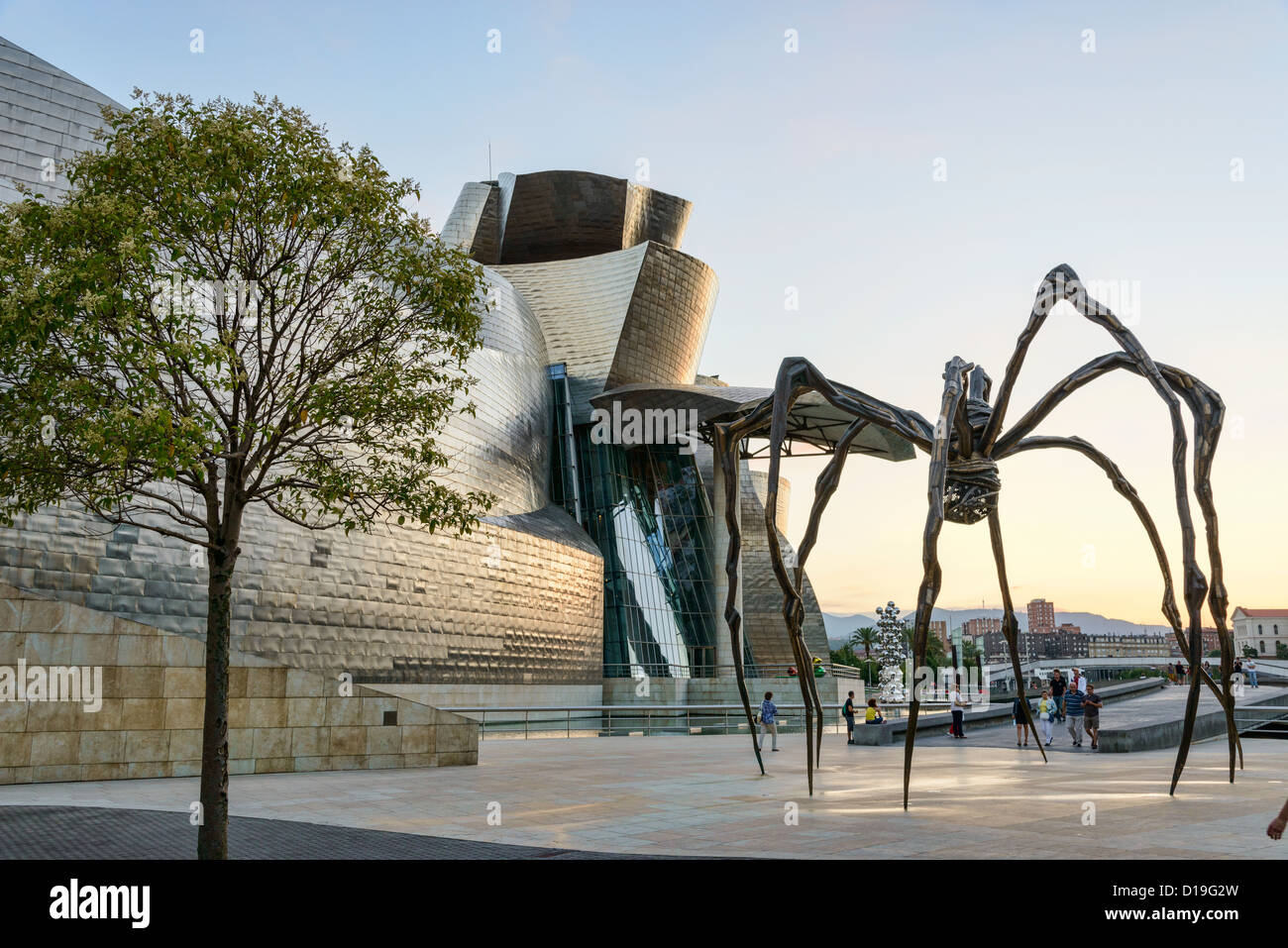 Giant spider sculpture in front of the Guggenheim Bilbao Museum Stock Photo