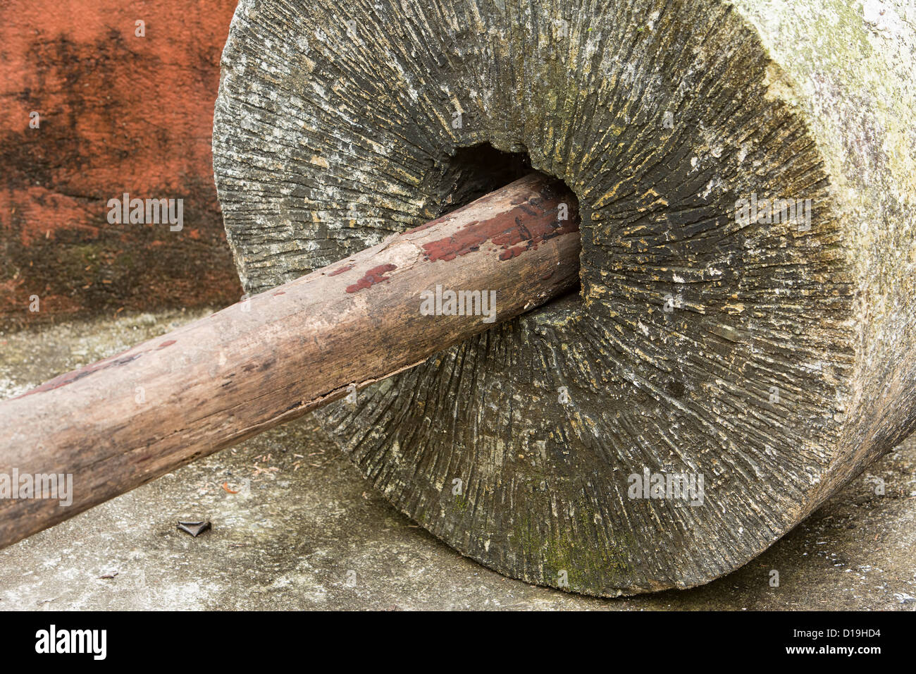 Grinding wheel in a tequila distillery. Mexico Stock Photo