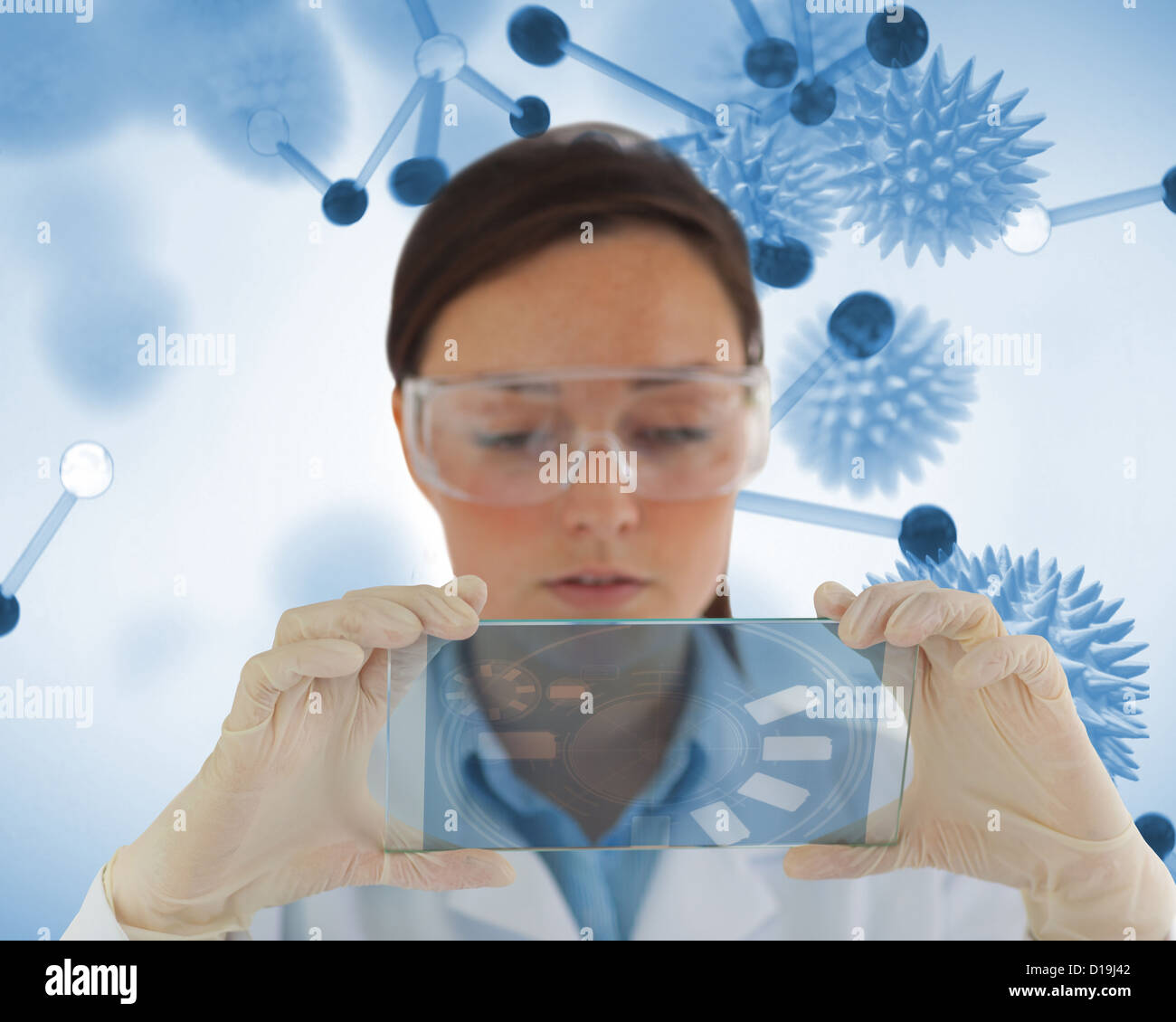 Careful nurse holding a virtual screen Stock Photo