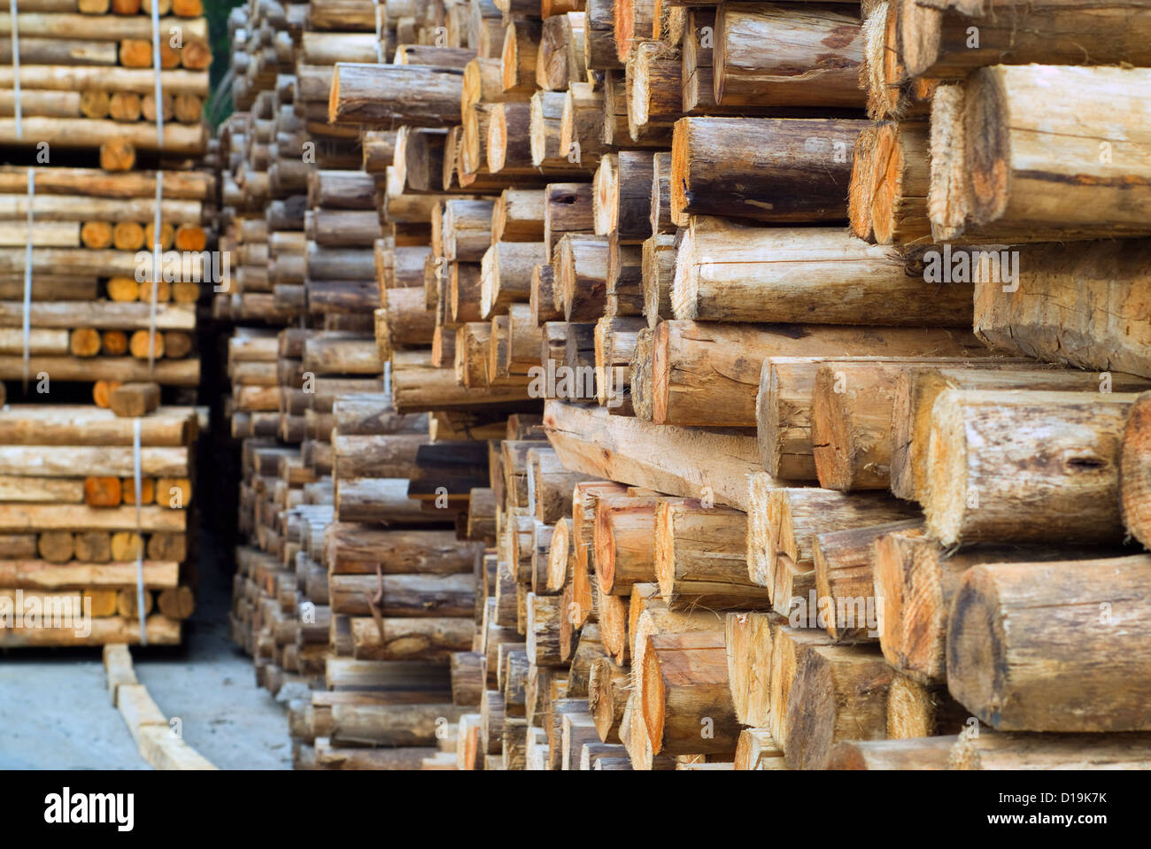 Stacked wood or timber in factory warehouse or storage area Stock Photo