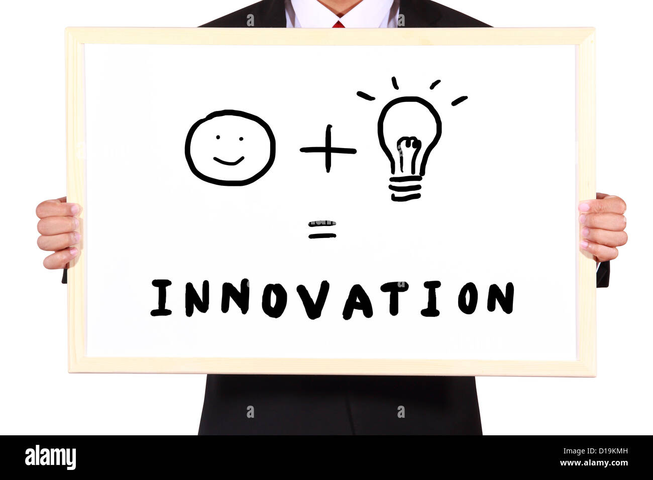 businessman show idea on whiteboard what is innovation Stock Photo