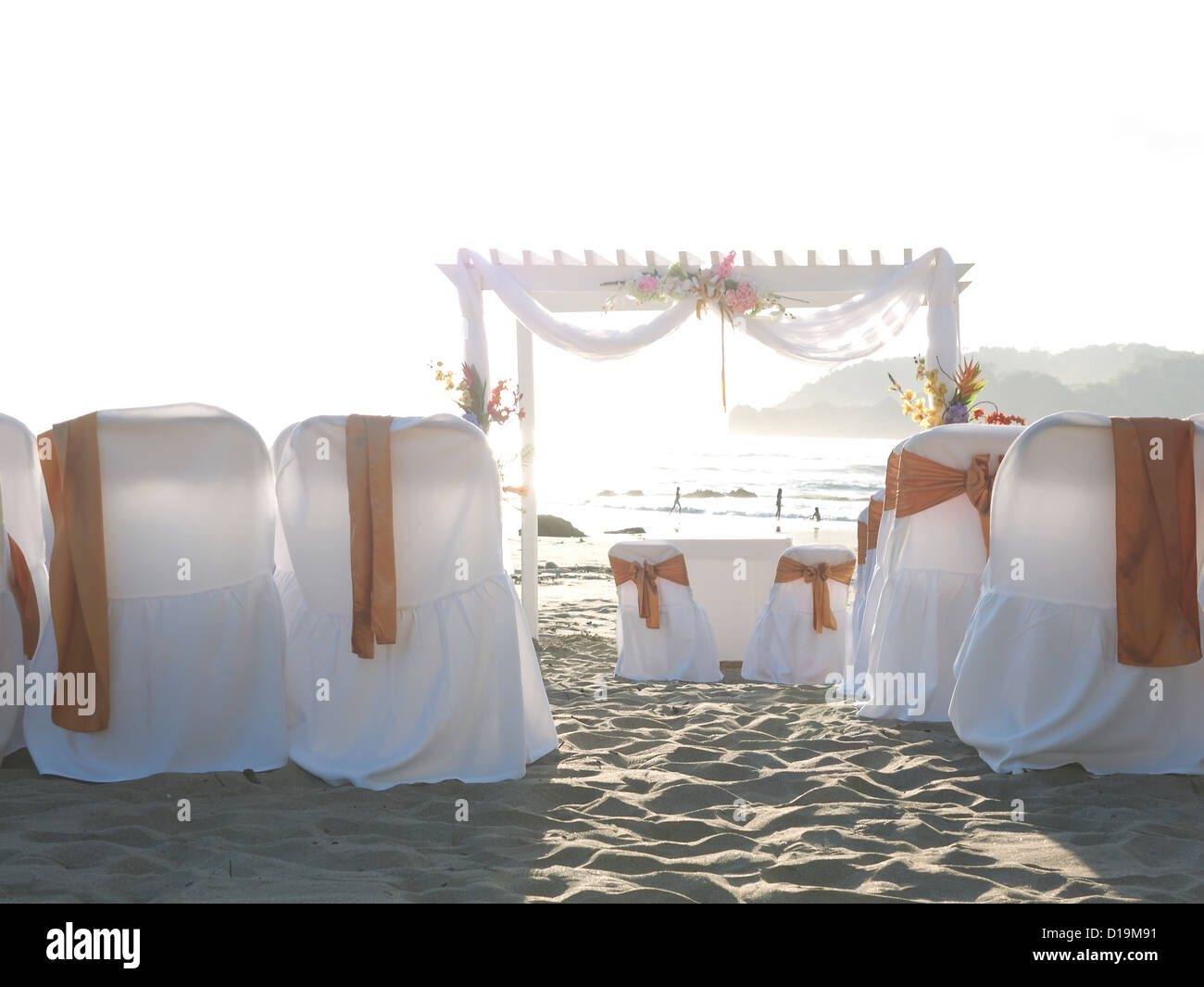 decoration with white chair covers for a wedding ceremony,Playa Carryllo; Nicoya Peninsula; Costa Rica Stock Photo
