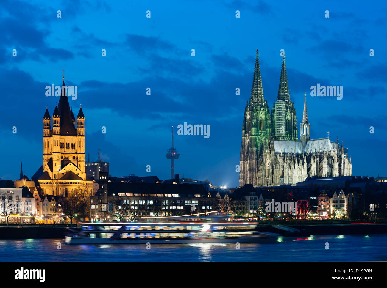 Evening skyline of Cologne with cathedral and River Rhine in Germany Stock Photo