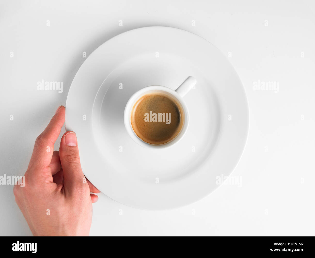 coffee plate with hand Stock Photo