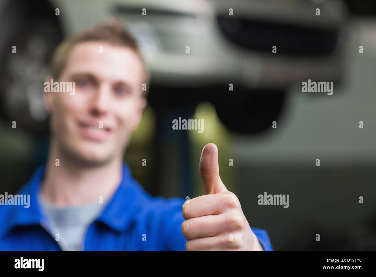 Auto mechanic gesturing thumbs up Stock Photo Alamy