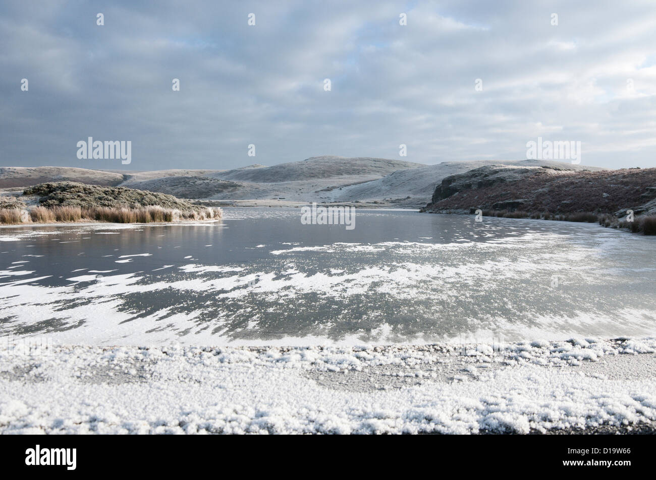 Powys County, Wales, UK. 12th December 2012. A lake freezes over in the Cambrian Mountains. Photo credit. Graham M. Lawrence/Alamy Live News. Stock Photo