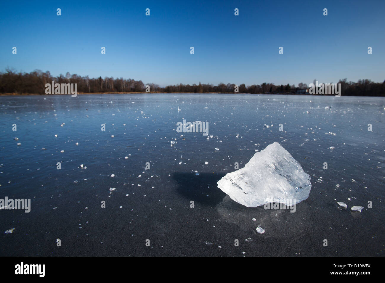 Freezing winter temperatures block of ice lying on the surface of a