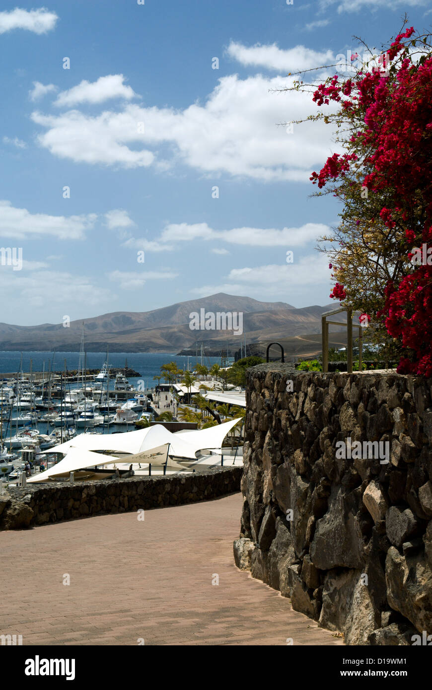 puerto calero harbourn with fermes mountains in the distance lanzarote canary islands spain Stock Photo