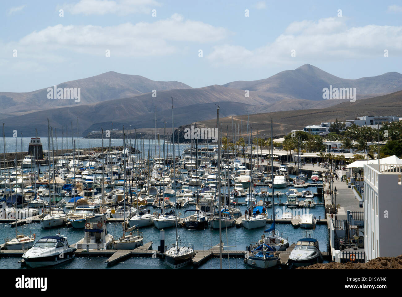 puerto calero harbourn with fermes mountains in the distance lanzarote canary islands spain Stock Photo