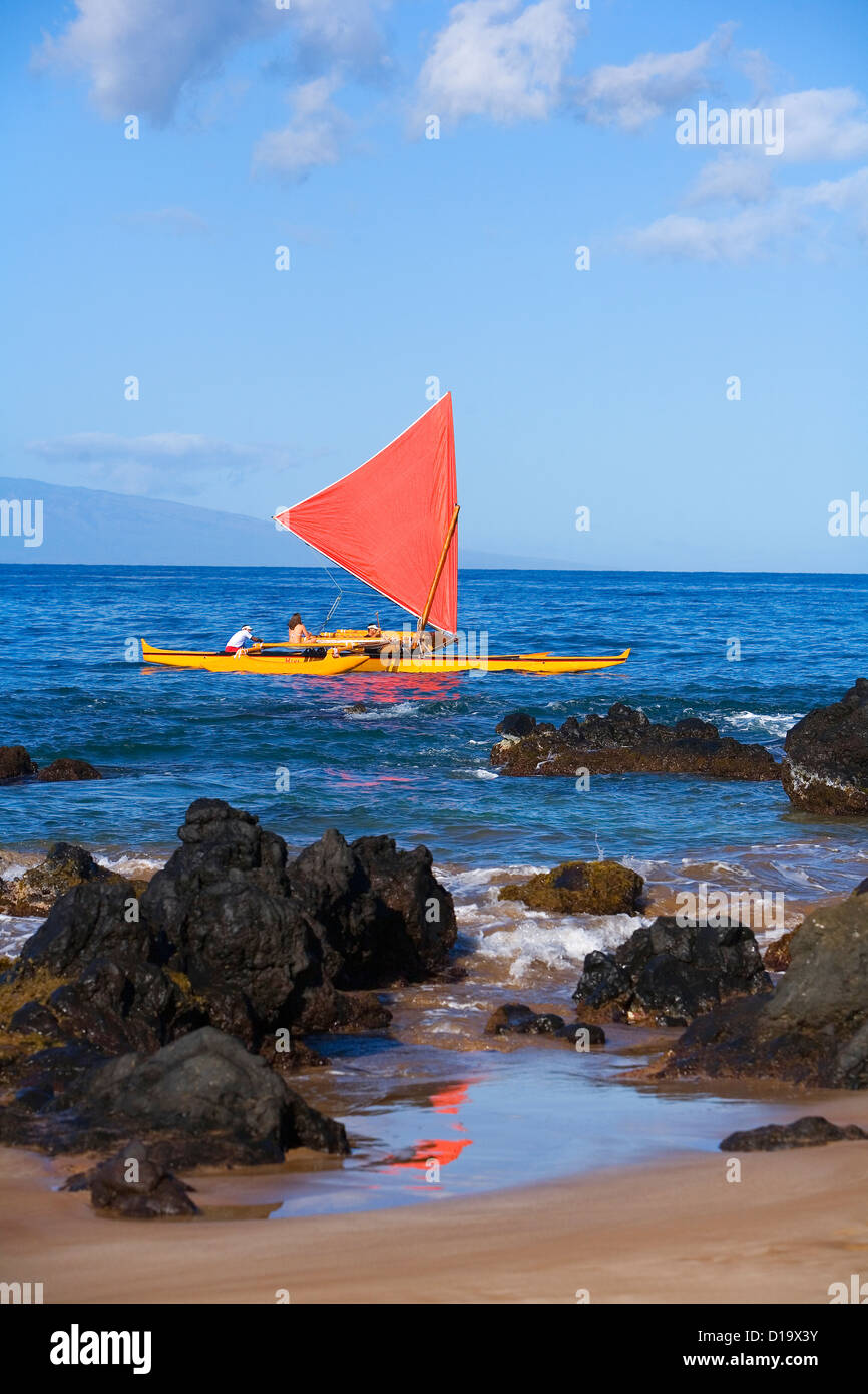 Hawaii, Maui, Wailea, Traditional Hawaiian Sailing Canoe Off Coastline