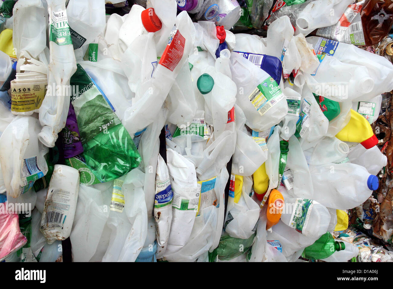 https://c8.alamy.com/comp/D1A06J/a-bale-of-plastic-milk-containers-and-other-plastic-bottles-ready-D1A06J.jpg