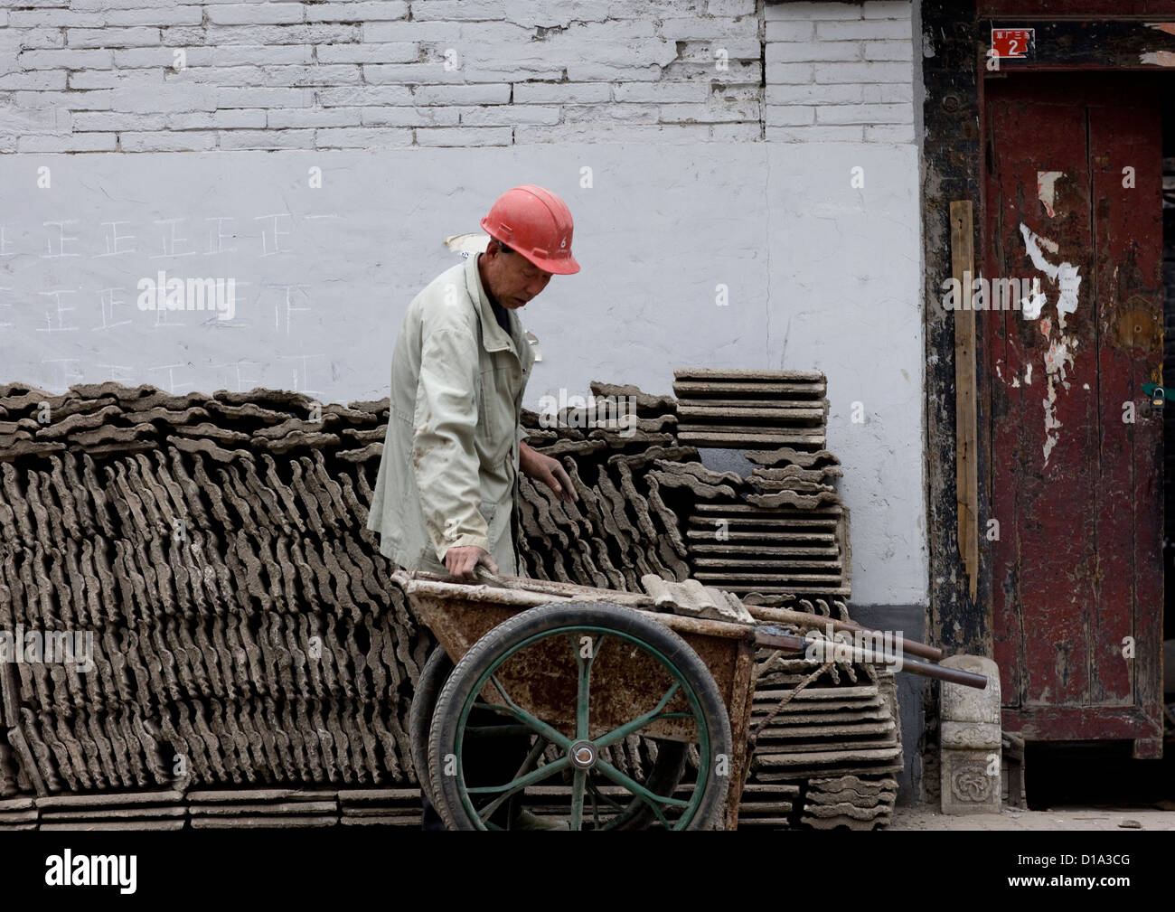 Manual Worker On A Contruction Site, Beijing, China Stock Photo