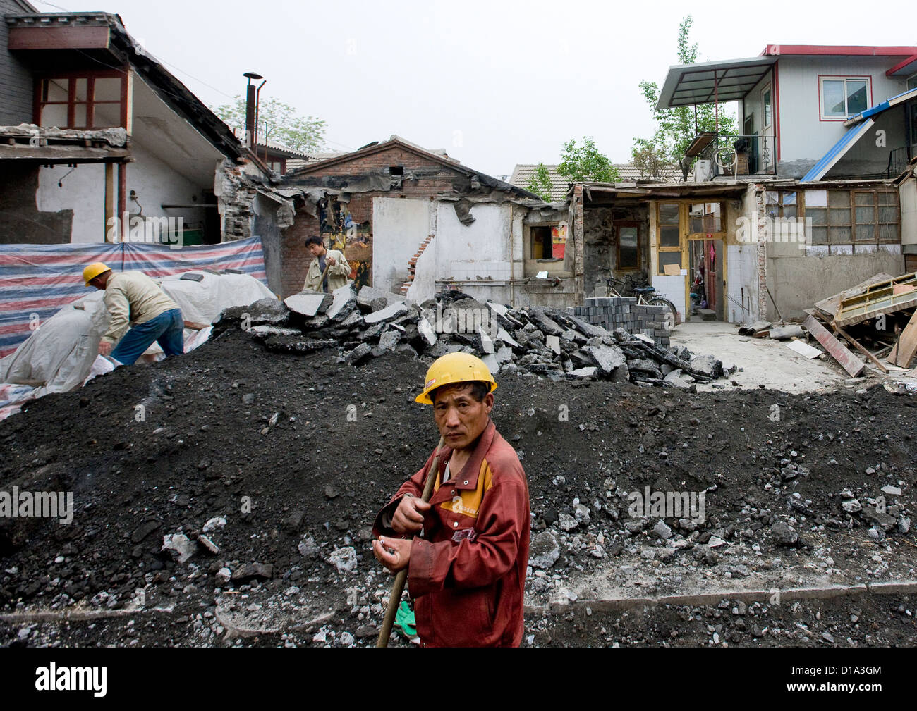 Manual Worker On A Demolition Site, Beijing, China Stock Photo