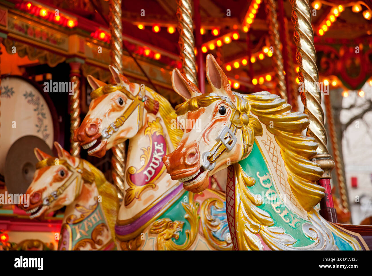 Close up of Carousel Merry-go-round roundabout funfair fairground rides ride horse horses York North Yorkshire England UK United Kingdom Great Britain Stock Photo