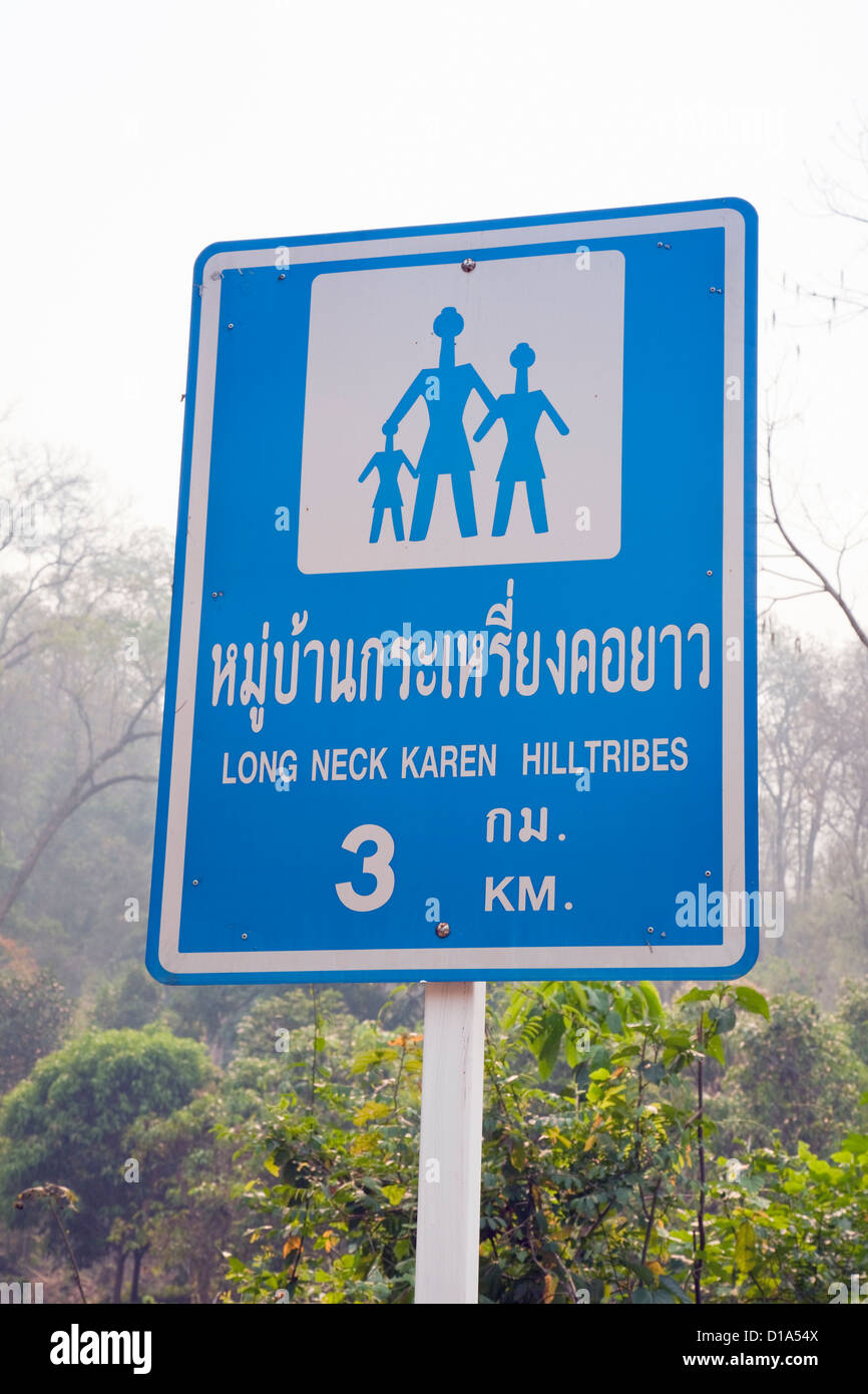 Road sign showing 'Long neck' Kayan people's village, Huai Seau Tao, Mae Hong Son Province, Thailand Stock Photo