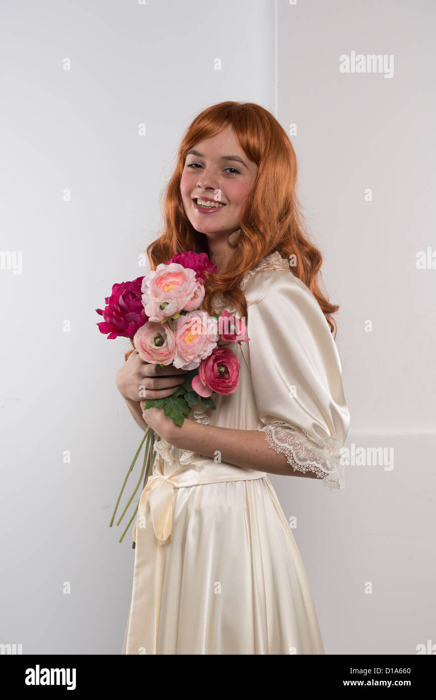 actor costume carnival theatre play person posing one young red woman  flowers gown Stock Photo - Alamy