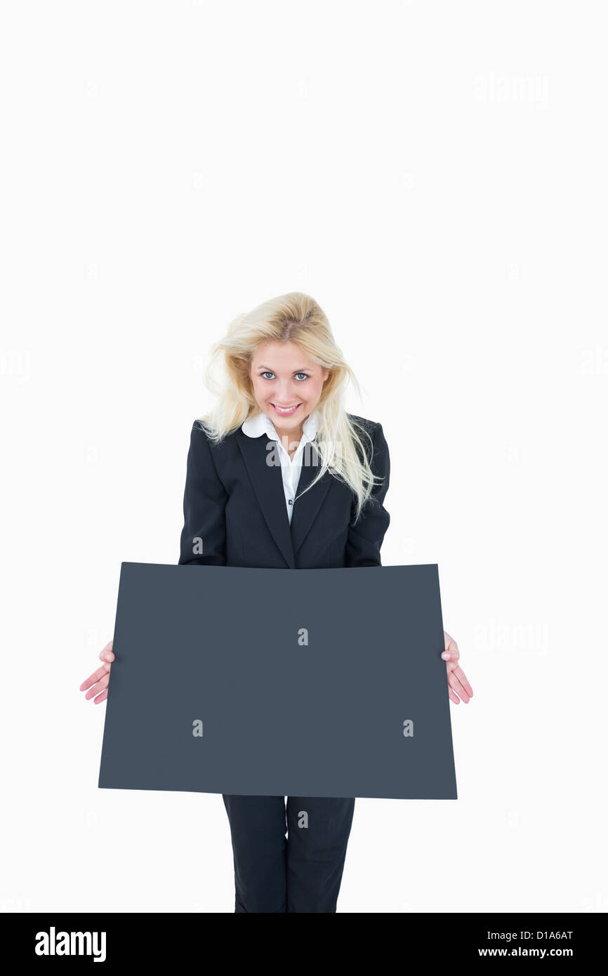 Portrait of business woman holding empty banner Stock Photo
