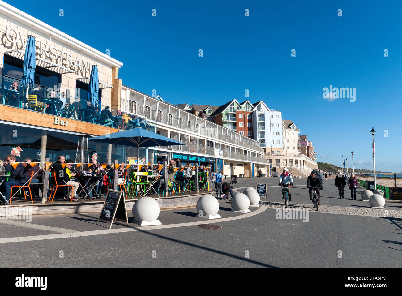 Boscombe beach promenade showing the Urban Reef Restaurant the Sorted Surf Shop and the new flat development by Barrett Homes Stock Photo