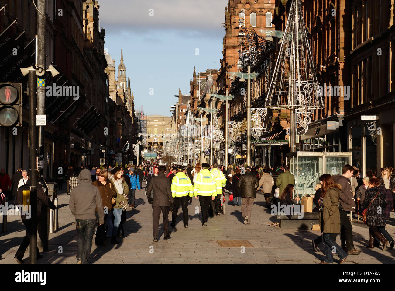 People Christmas shopping on Buchanan Street Shopping Precinct in Glasgow city centre, Scotland, UK Stock Photo