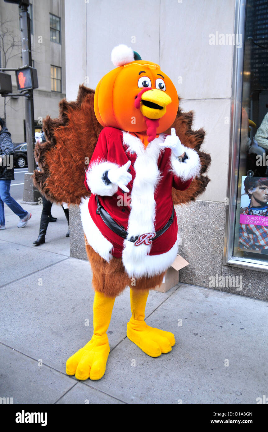 A person wearing a Thanksgiving turkey costume... Stock Photo