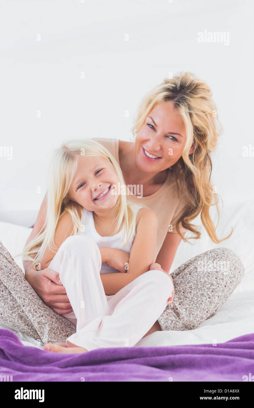 Mother and her daughter looking at camera Stock Photo - Alamy